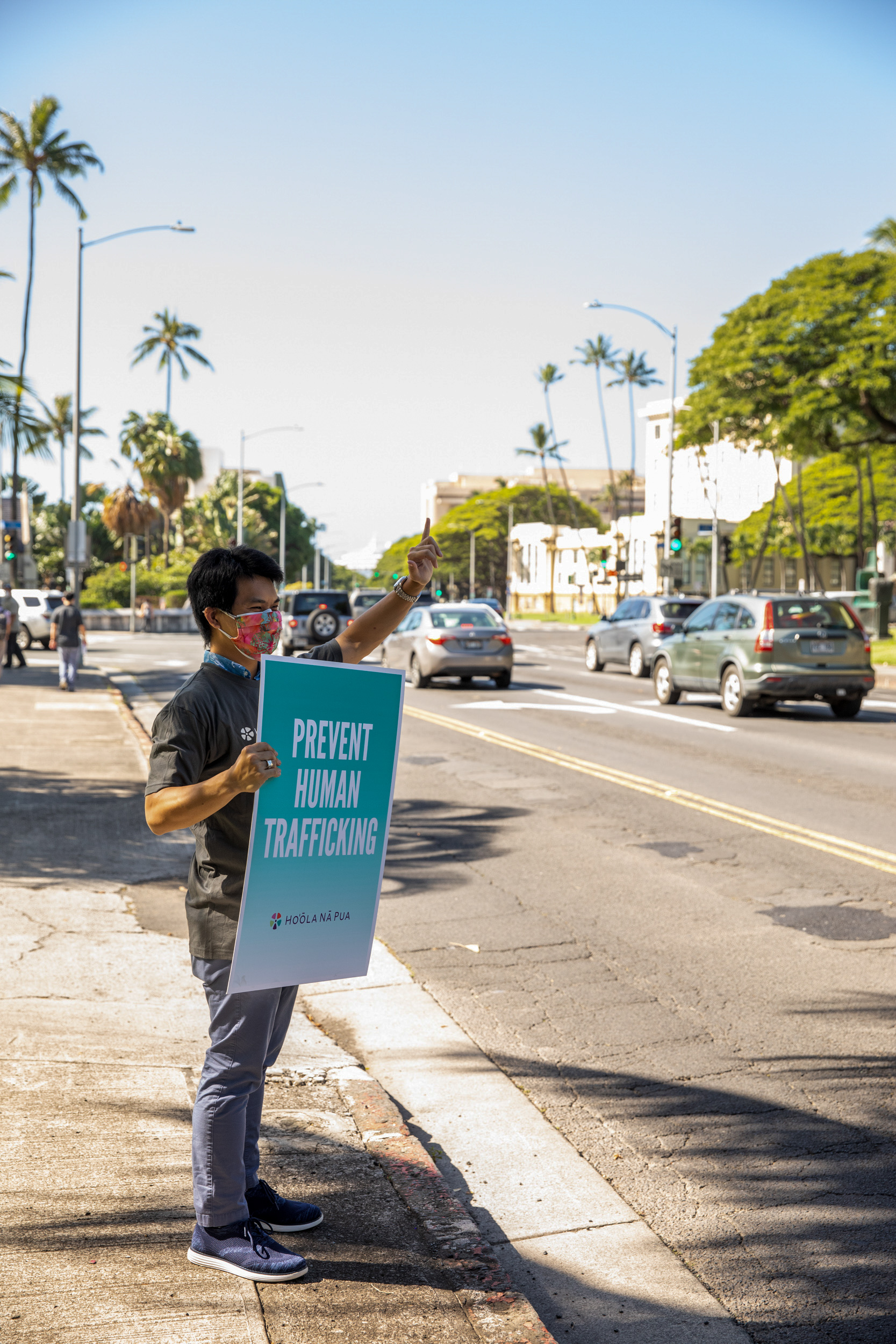 man standing against human trafficking in Hawaii